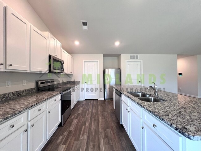 Building Photo - 645 Wild Tulip Ct