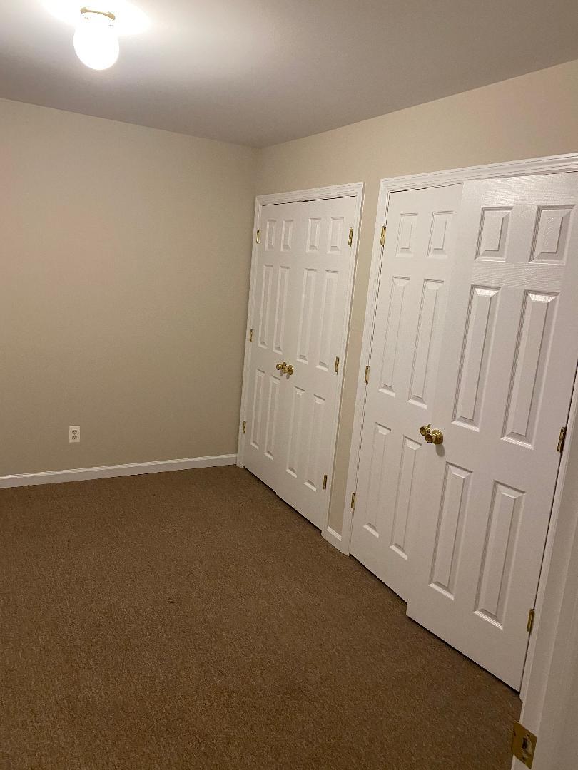 Bedroom w/ 2 double door closets - 38 Main St