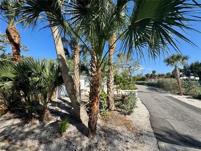 Building Photo - 7372 Melaleuca Way