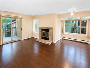 Building Photo - Modern Wooded Condo with Upgraded Kitchen & Private Deck