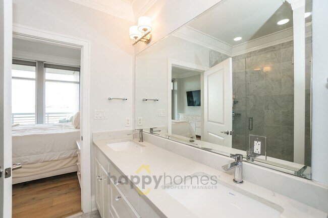 Building Photo - Waterfront Oasis: Fully Furnished 1BR/1.5BA with Marsh Views