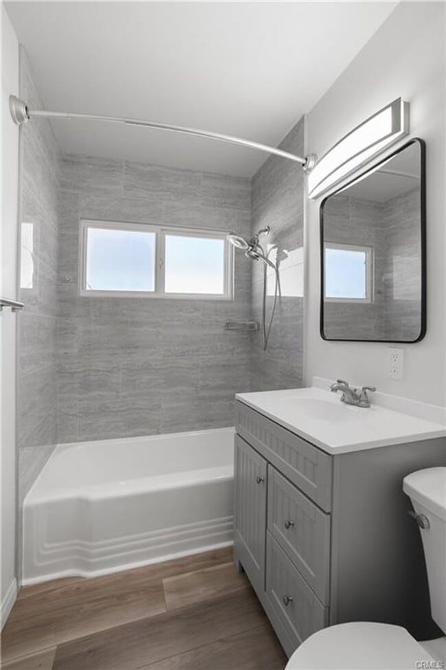 Building Photo - Welcome to this inviting 3 bedroom, 2 bath residence tucked away on a peaceful street in the hear...