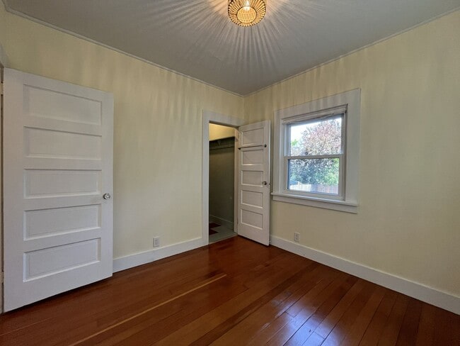 Building Photo - Charming Cottage with Hardwood Flooring, Modern Kitchen & Beautiful Outdoor Living Areas