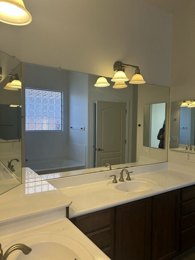 Building Photo - Unfurnished four bedroom large home!  Three car garage