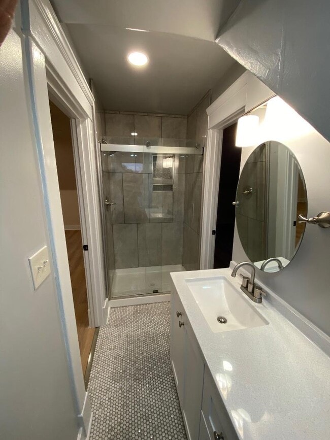 Large shower, floor to ceiling tile - 769 Delta Ave