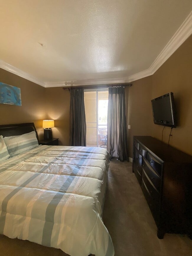 Building Photo - Fully furnished 2 bedroom unit in 24/7 guard gated community