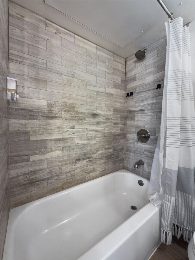 Building Photo - Perfectly Located 1-Bedroom Condo For Lease