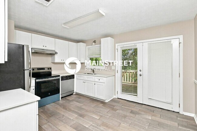 Building Photo - 4 Bedroom Pet-Friendly Home in Conyers, GA with Main Street Renewal