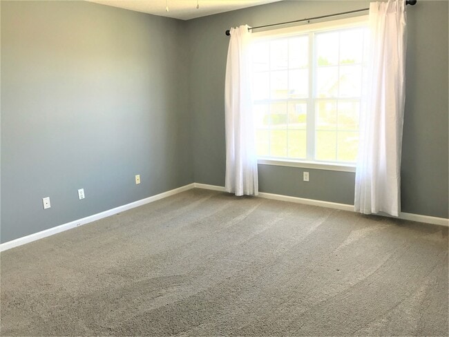 Building Photo - Great Family Home -  Fenced Backyard - Garage!