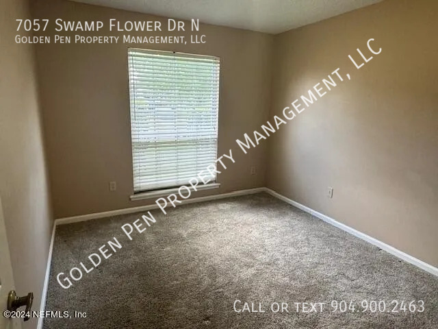 Building Photo - 7057 Swamp Flower Dr N