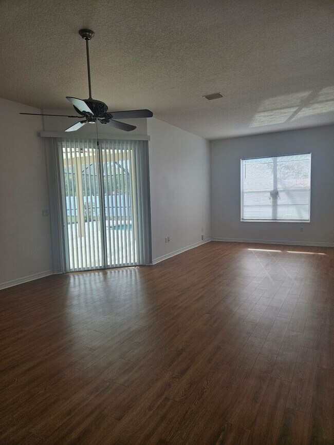 Building Photo - 4 BEDROOM 3 FULL BATH HOME WITH A SCREENED IN POOL IN THE BEAUTIFUL PALM COAST