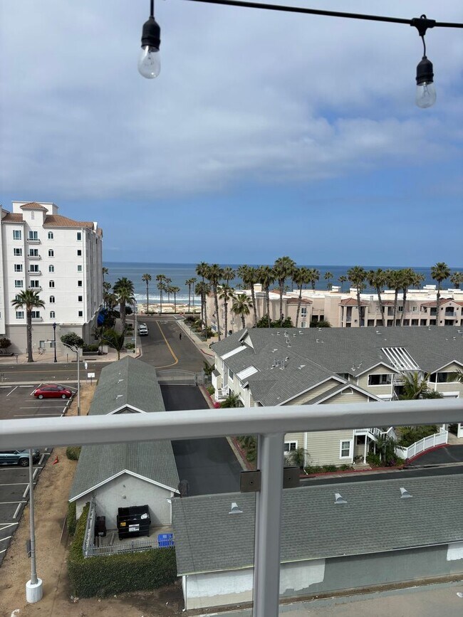 Building Photo - Live the Coastal Life- 2BR/2BA Condo Just ...