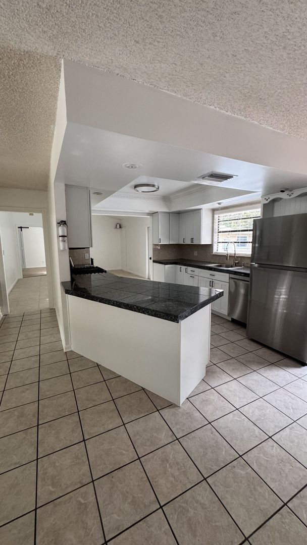 Building Photo - 3/2 POOL home in Harbor Estates Stuart--No HOA & Lots of Parking!