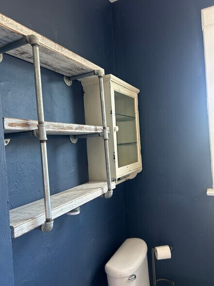 Bath shelving and antique medicine cabinet - 1152 Jaeger St