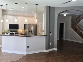 Building Photo - Freshly Painted 4BR/2BA Pool Home with Screened Pool & Spa – Move-In Ready!