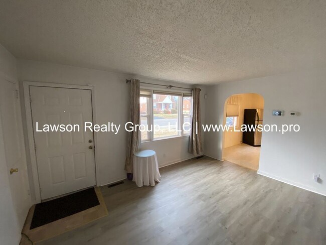 Building Photo - Well Maintained Three Bedroom with Fenced Yard and Shed