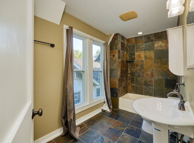 Building Photo - Charming 4-Bedroom Home with Gleaming Hardwood Floors in Vibrant Minneapolis Neighborhood!