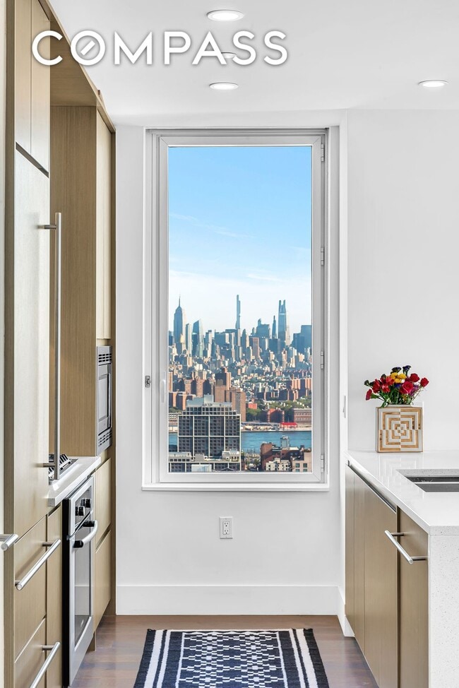 Building Photo - Elegant Condo Living with Impressive Views and Exclusive Building Amenities in the Heart of Downt...