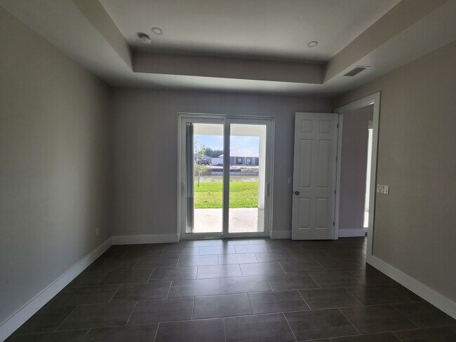Building Photo - Beautiful New Construction 4BR/ 2BA In Cap...