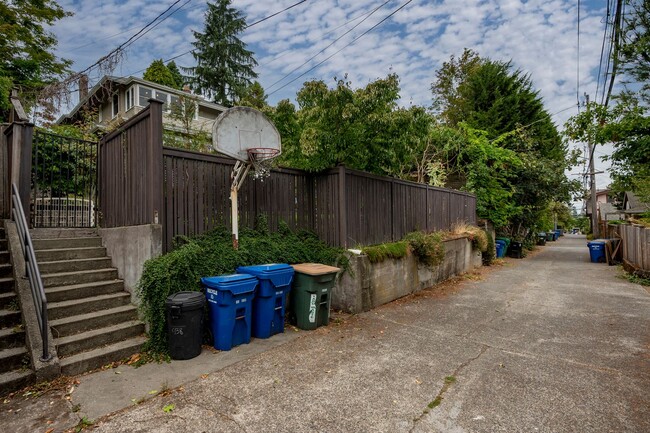 Building Photo - Traditional Four-Corner Craftsman Home on ...