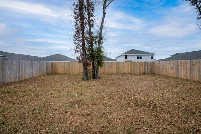 Building Photo - Beautiful 3BR Home with Privacy-Fenced Backyard in The Woodlands