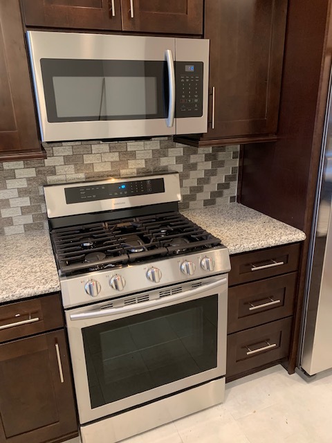 Stainless steel stove, oven and microwave. Granite countertops. - 365 Beloit Ave