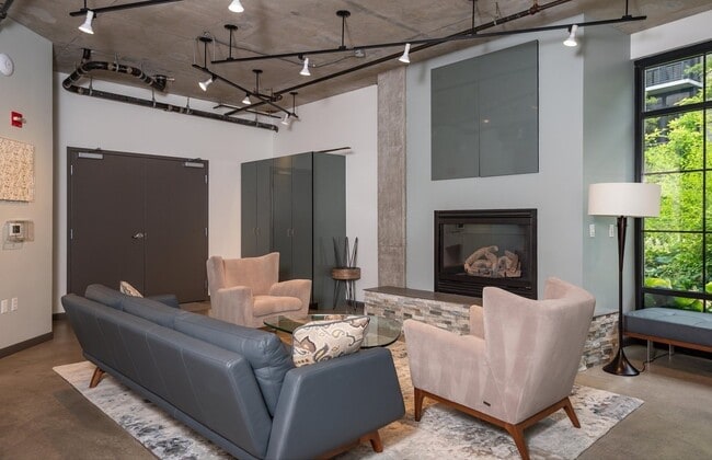 Building Photo - Rare Availability in the Streetcar Lofts, Parking, and Some Utilities Included