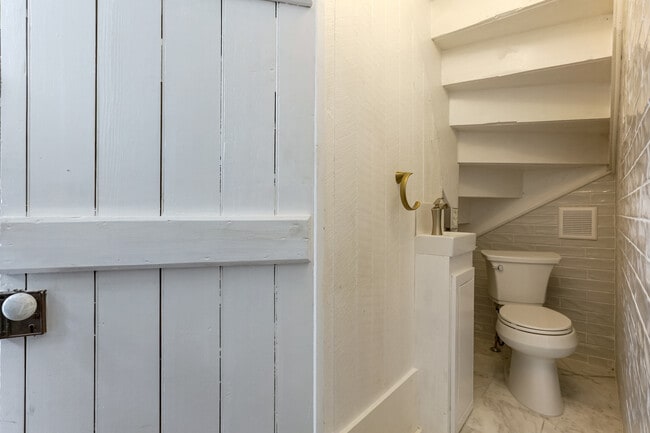 Downstairs half bath/WC - Newly renovated - 1220 Harmony St