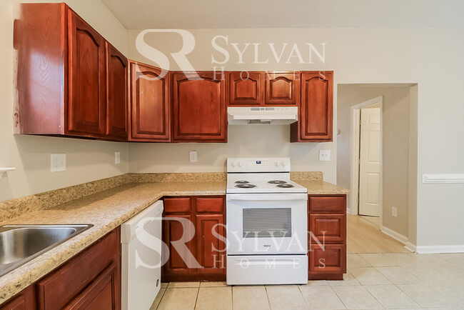 Building Photo - The living is easy in this 3 bedroom, 2.5 ...