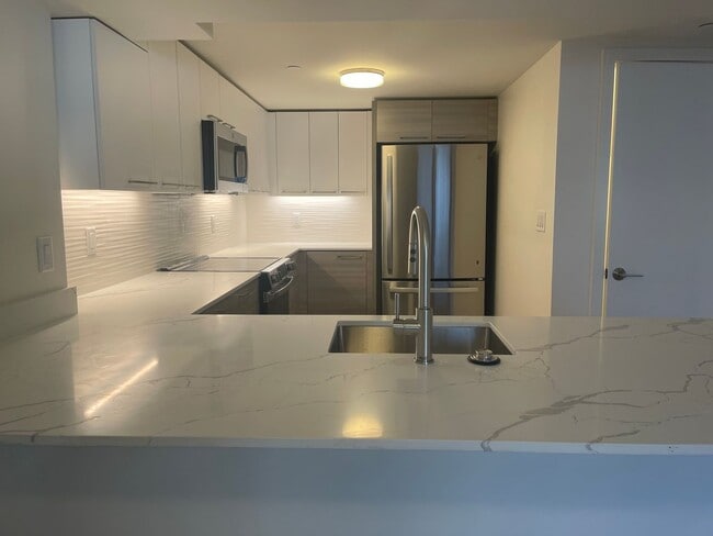 Building Photo - LUXURY 2 BED 2.5 BATH DUPLEX, All New , Laundry in Unit Garage Pool,. NO fee