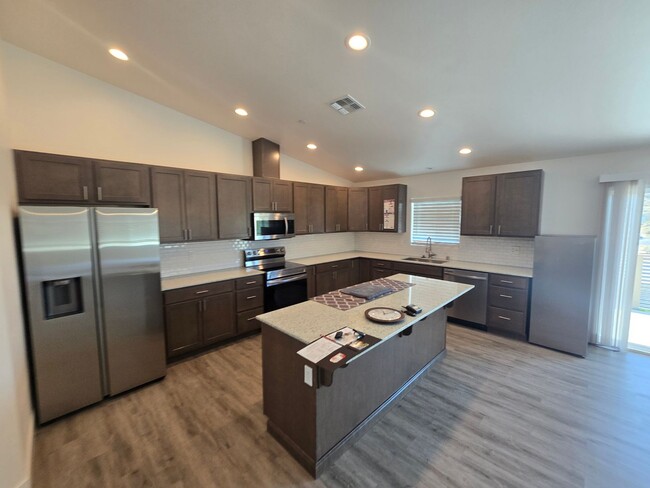 Building Photo - Beautiful, Clean 4 bedroom with Solar!!