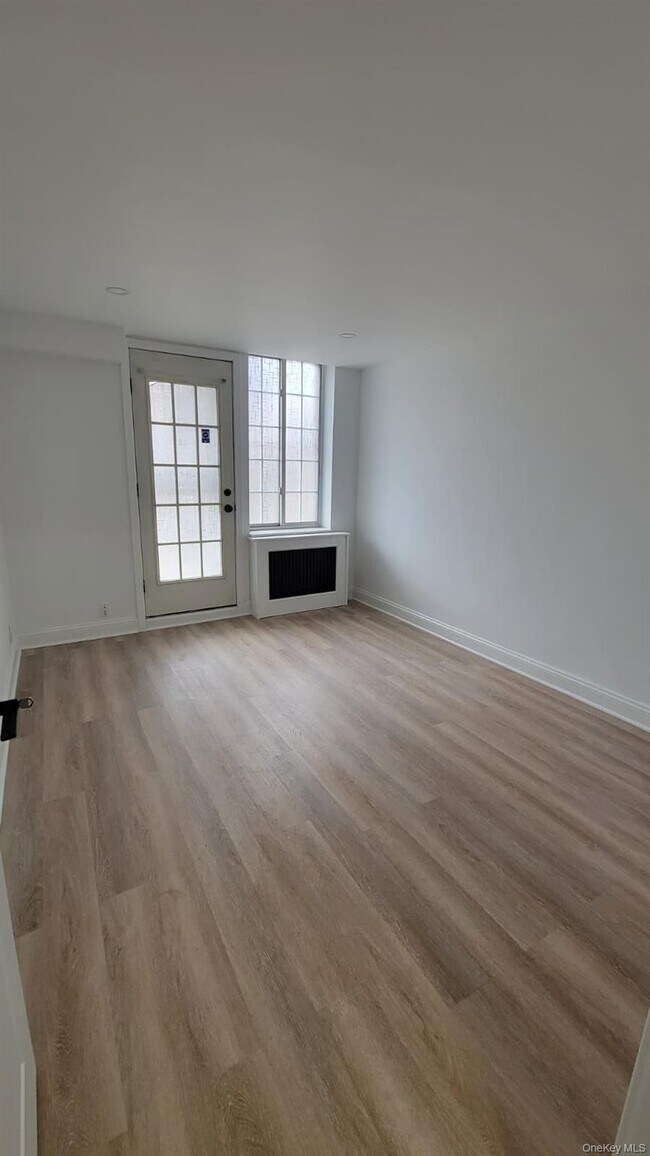 Building Photo - 60-24 Wetherole St