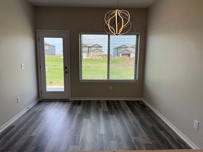Building Photo - Brand new ranch townhome with 3 stall garage. Spacious 2 bedrooms with walk in closets, 2.5 bathr...