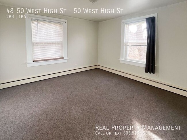 Building Photo - Pet-Friendly 2BD Apartment with Sunroom an...