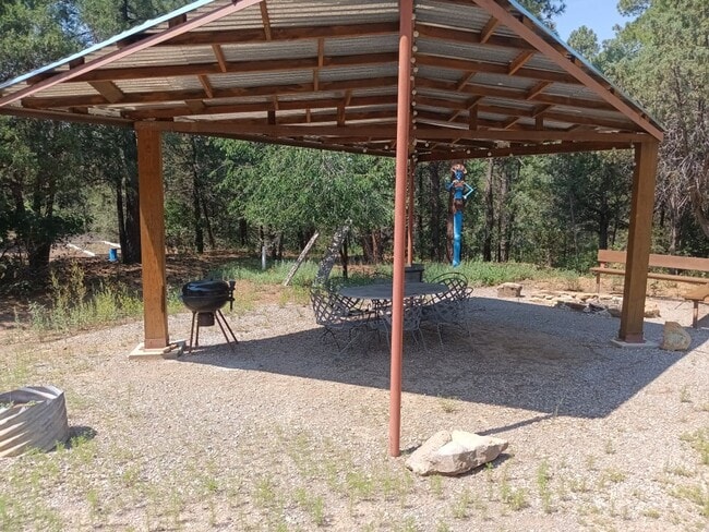 Building Photo - COZY HOME IN THE BEAUTIFUL TOWN OF TIJERAS | Showings available NOW!!