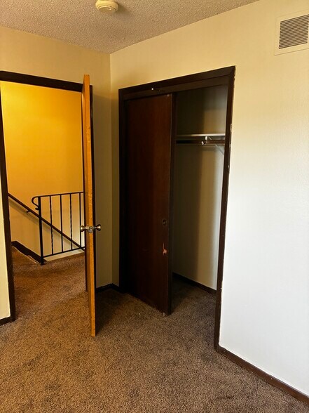 The closet and doorway in the rear bedroom - 1205 Randolph St