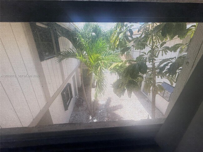 Building Photo - 10787 Royal Palm Blvd