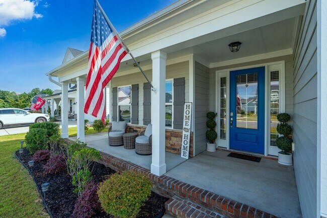 Building Photo - Stunning 4 bedroom 2.5 bath home located in Hampstead Wyndwater Community