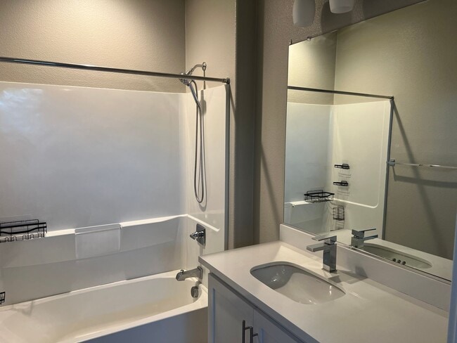 Building Photo - CONTEMPORARY BRIGHT SPACIOUS TOWNHOME WITH...