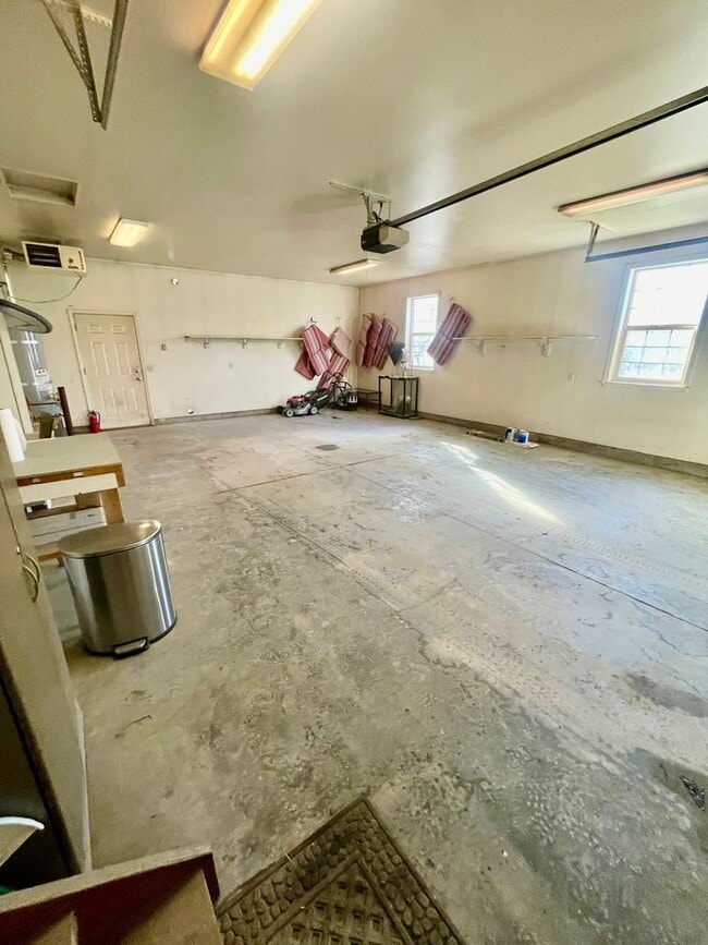 Building Photo - Ranch style 3bedroom/2 bathroom with an Oversized two car garage +giant carport!  Large private l...