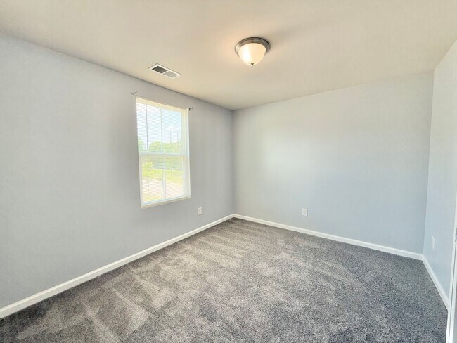 Building Photo - Charming 3BD, 1.5BA Clayton Home Near Shopping and Dining with Modern Updates