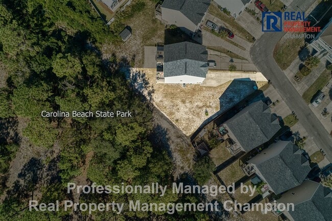 Building Photo - Spacious 3-Story Townhome in the Heart of Carolina Beach — Backs to State Park