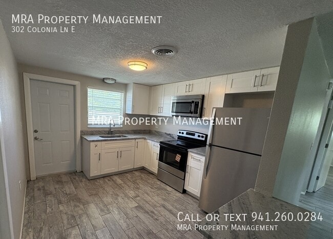 Building Photo - 302 Colonia Ln E