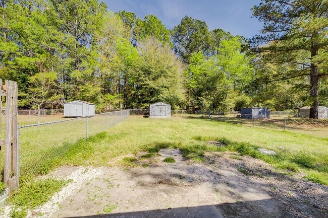 Building Photo - Cozy 2BR Duplex with Fenced Yard in Convenient Rincon Location