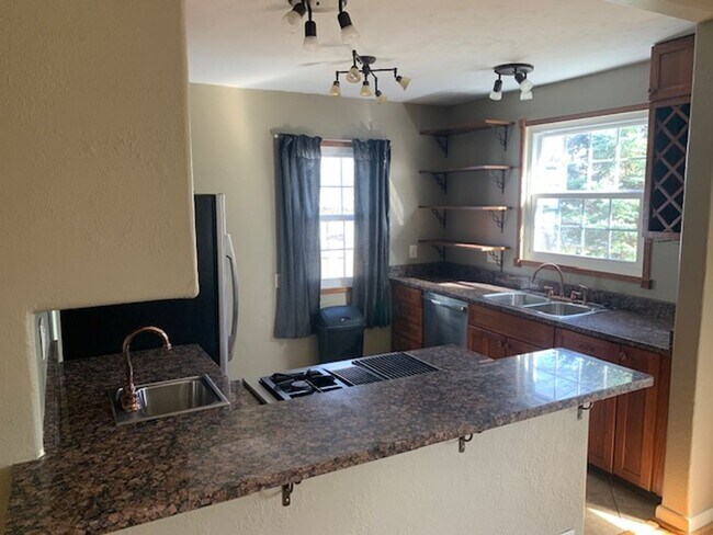 Building Photo - Great Location! Great House! Enjoy baseball games and the park attractions