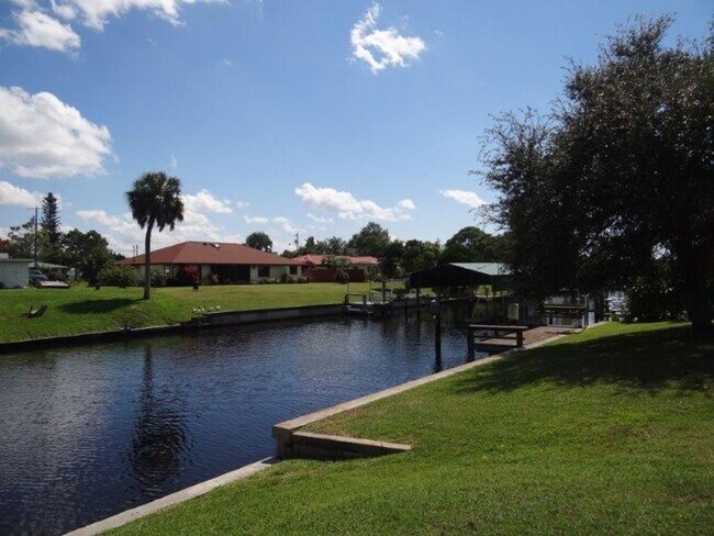 Building Photo - AVAILABLE SEASON 2027   PORT CHARLOTTE, HEATED POOL HOME, SALT WATER CANAL   $3900