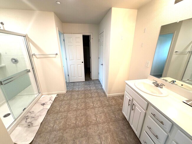 Building Photo - Spacious 5BR + Loft in Hamptons Village – Studio Suite, New HVAC, EV Charging