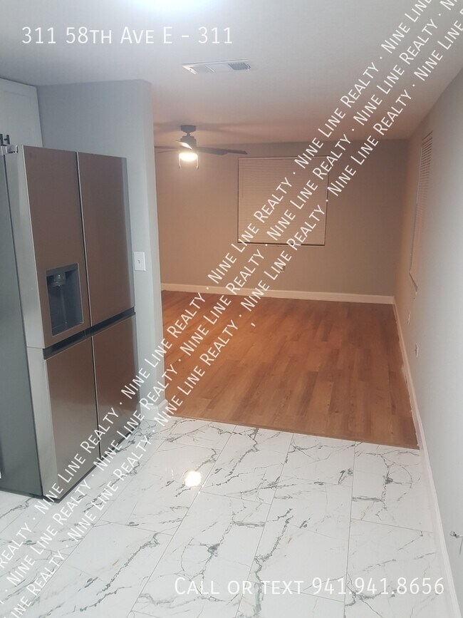 Building Photo - 311 58th Ave E