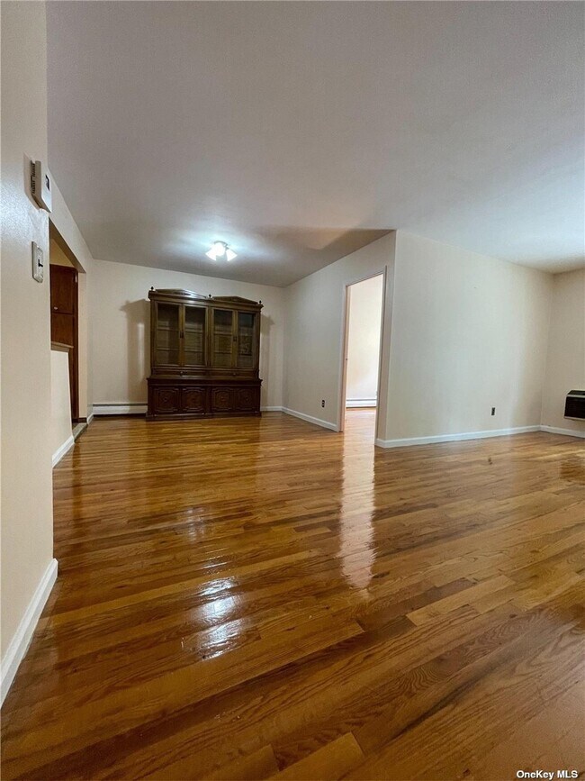 Building Photo - 61-23 Tonsor St