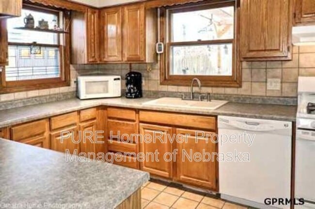 Building Photo - 1009 N 49th Ave